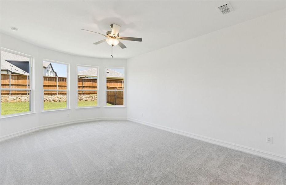 Elegant owner's suite with Bay window *real home pictured