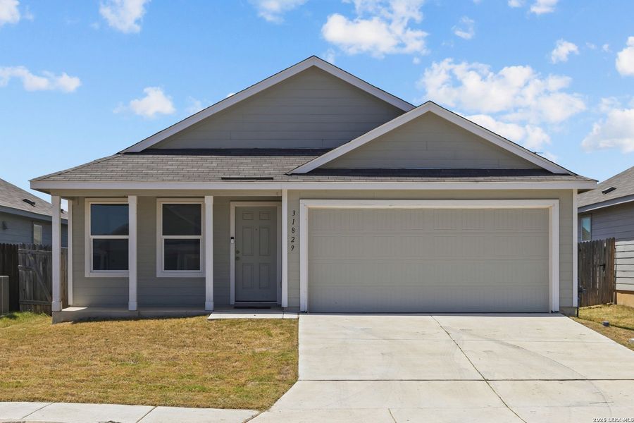 Front exterior of a new home in Hidden Trails, Bulverde, TX, highlighting curb appeal (Image 16).