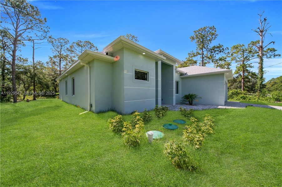 Exterior details and patio area of a home in , Lehigh Acres (Image 23). Exterior details and patio area of a home in , Lehigh Acres (Image 23).