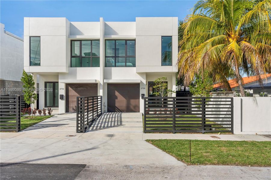 Front exterior of a new home in , Miami, FL, highlighting curb appeal (Image 27). Front exterior of a new home in , Miami, FL, highlighting curb appeal (Image 27).