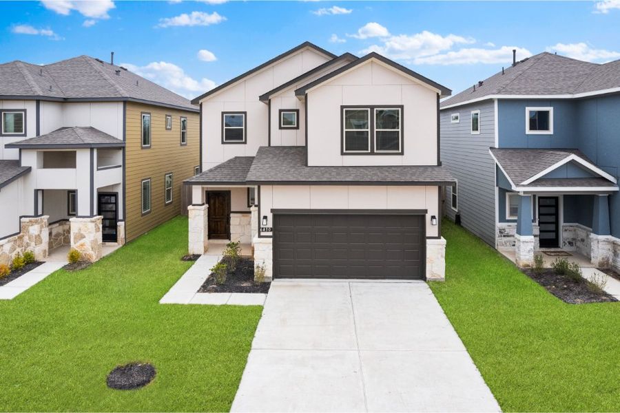 Front exterior of a new home in Glendale Lakes, Rosharon, TX, highlighting curb appeal (Image 1). Front exterior of a new home in Glendale Lakes, Rosharon, TX, highlighting curb appeal (Image 1).