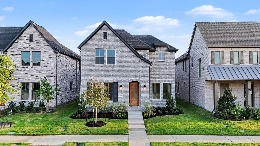 Front exterior of a new home in Light Farms Brenham - 40' Lots, Celina, TX, highlighting curb appeal (Image 20).