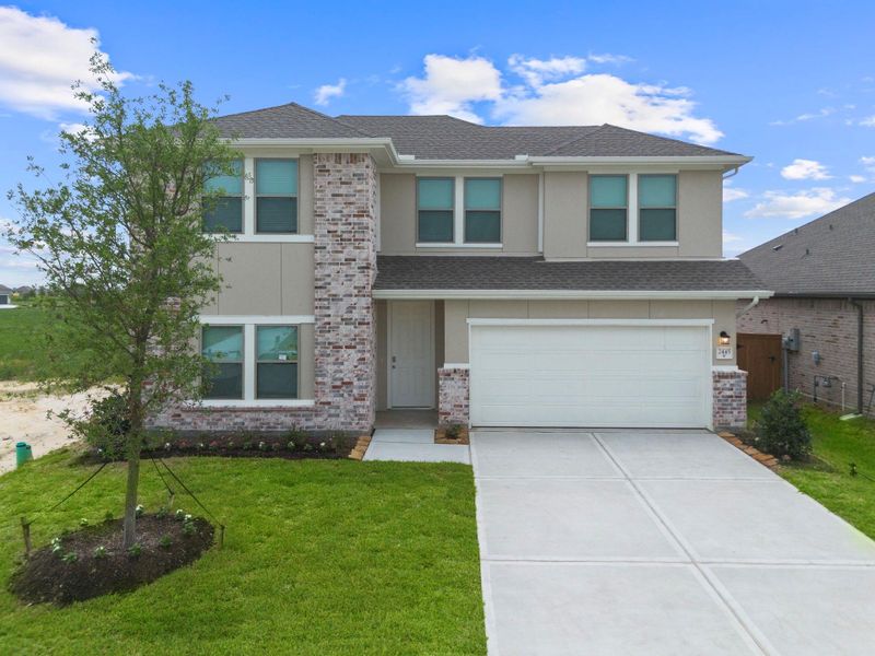 Front exterior of a new home in River Ranch Trails, Dayton, TX, highlighting curb appeal (Image 16). Front exterior of a new home in River Ranch Trails, Dayton, TX, highlighting curb appeal (Image 16).