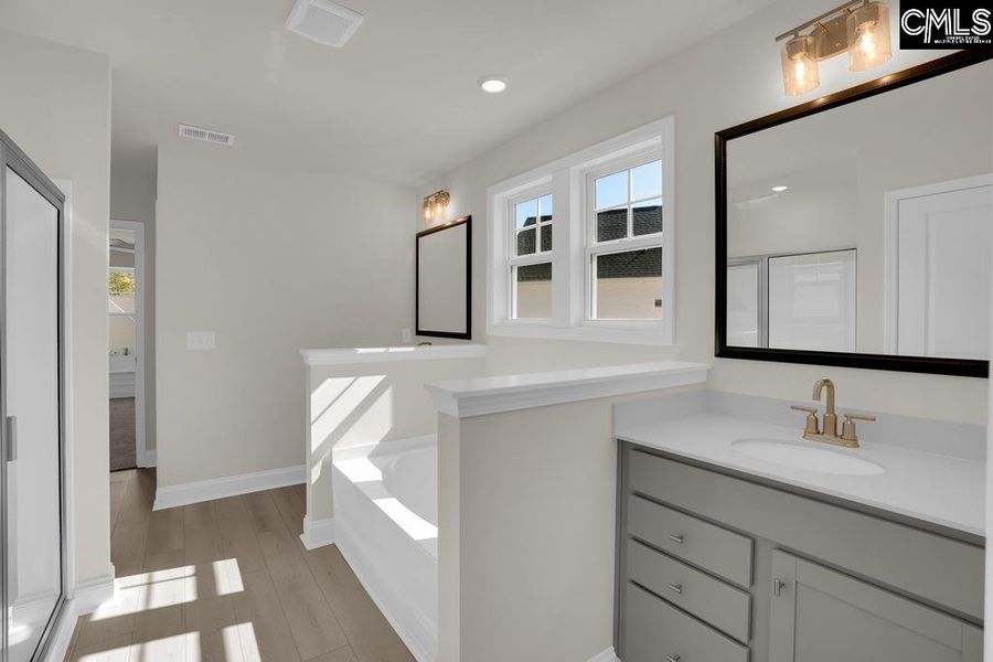 Furnished interior view inside a new home in Cottages at Roofs Pond, West Columbia (Image 9).