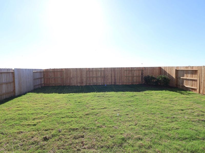 Exterior details and patio area of a home in Sorella, Tomball (Image 23).