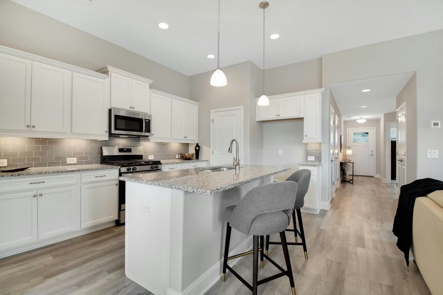 Representative furnished interior of a home built from the The Everleigh by Windsong Properties in Madeira, Acworth (Image 9).