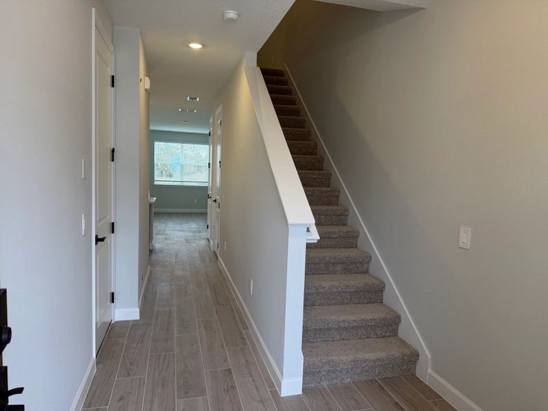 Front entrance opens up into spacious foyer