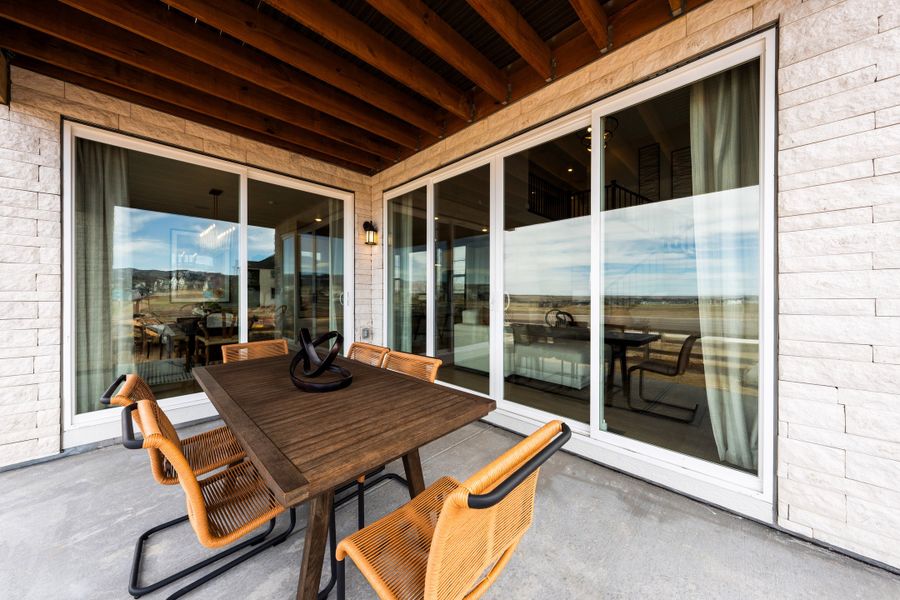 Exterior details and patio area of a home in Sterling Ranch Ascent Village, Littleton (Image 3).
