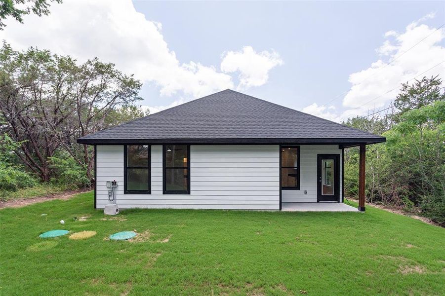 Exterior details and patio area of a home in , Granbury (Image 27).