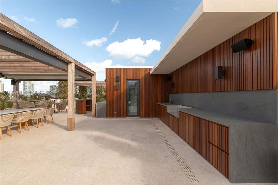 Exterior details and patio area of a home in , Miami Beach (Image 19).