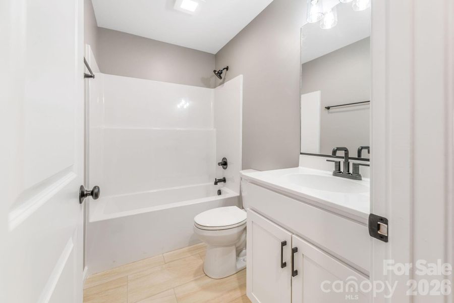 Furnished interior view inside a new home in , Waynesville (Image 7).