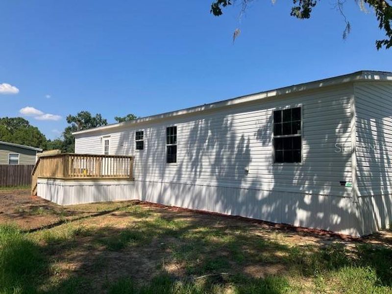 Front exterior of a new home in , Wesley Chapel, FL, highlighting curb appeal (Image 11).