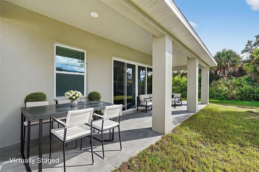 Exterior details and patio area of a home in , North Port (Image 29).