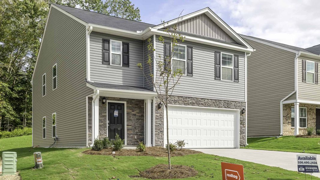 Front exterior of a new home in Willow Mill, Thomasville, NC, highlighting curb appeal (Image 2). Front exterior of a new home in Willow Mill, Thomasville, NC, highlighting curb appeal (Image 2).