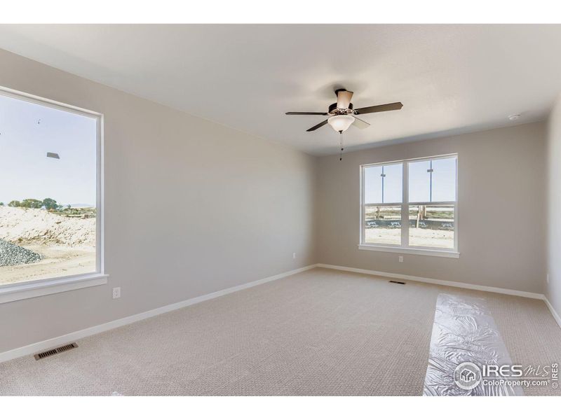 Spacious, unfurnished interior of a new home in Barefoot Lakes, Firestone (Image 15).