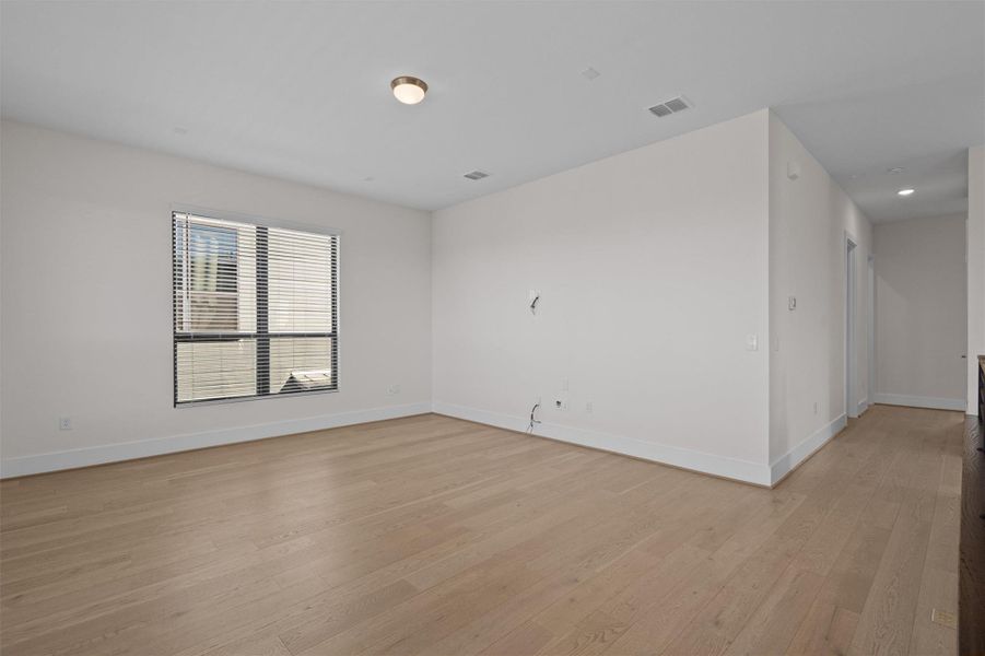 Unfurnished room with light wood-type flooring Unfurnished room with light wood-type flooring