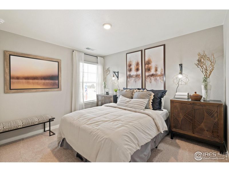 Furnished interior view inside a new home in Fossil Creek Ranch, Windsor (Image 9).