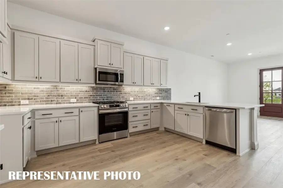 Any chef would be proud to call this dream kitchen their own!  REPRESENTATIVE PHOTO