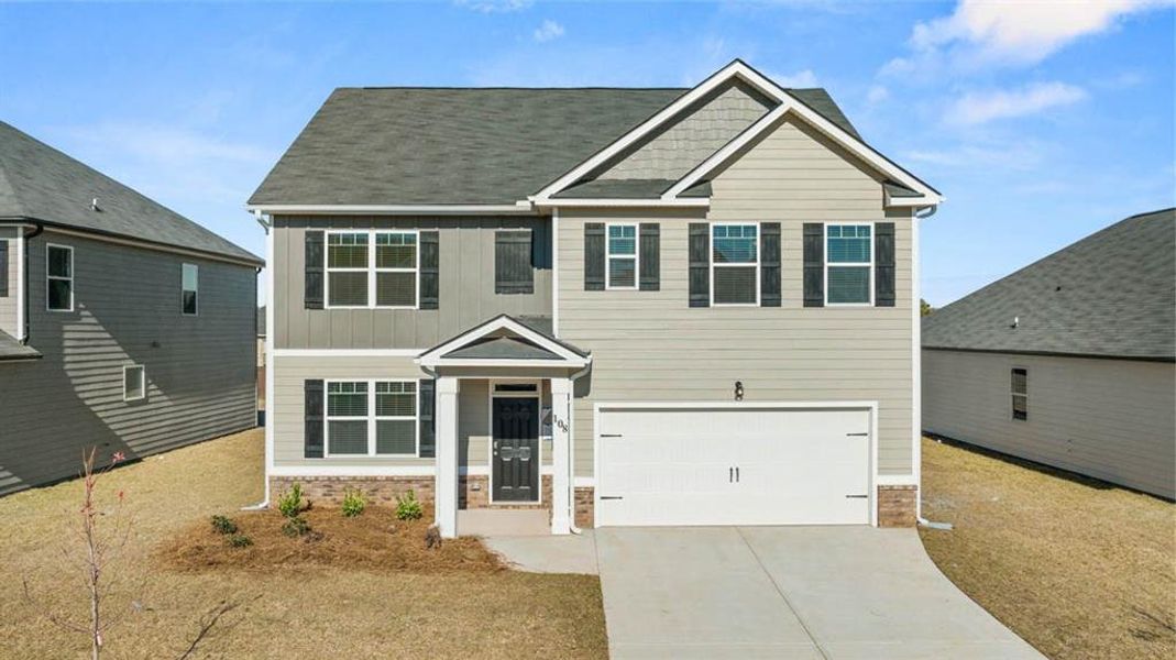 Craftsman-style house with a garage