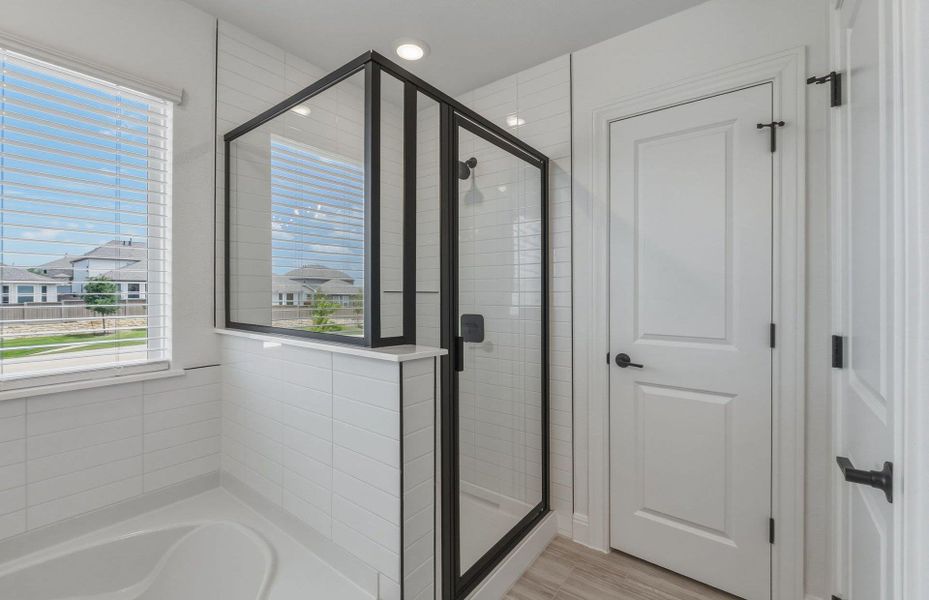 Furnished interior view inside a new home in Horizon Lake, Leander (Image 7).