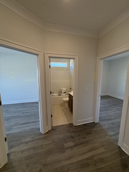 Hall with 2 bedrooms and Full Bath