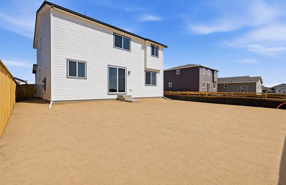 Exterior details and patio area of a home in Murata Farms, Fort Lupton (Image 4).