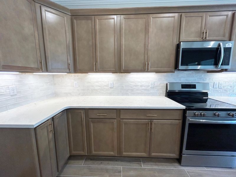 Furnished interior view inside a new home in Natureview, Freeport (Image 7).