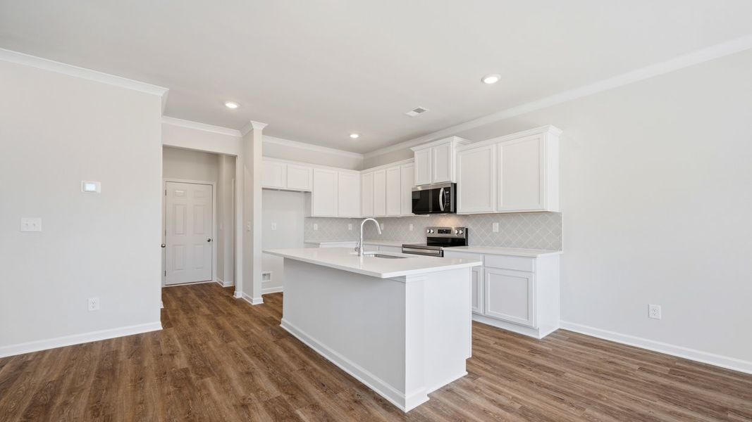 Furnished interior view inside a new home in Independence Villas and Townhomes, Loganville (Image 6).
