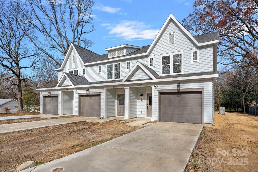 Front exterior of a new home in , Charlotte, NC, highlighting curb appeal (Image 4).