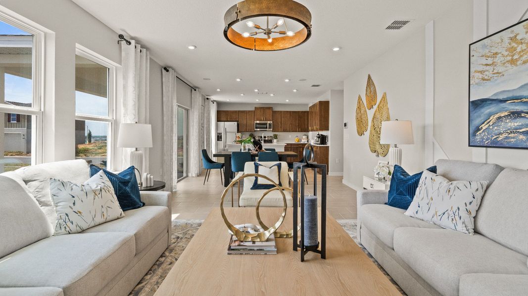 The First Floor Living Area in the Model Highbourne by DRB Homes in Hamilton Bluff located in Haines City, FL. The First Floor Living Area in the Model Highbourne by DRB Homes in Hamilton Bluff located in Haines City, FL.