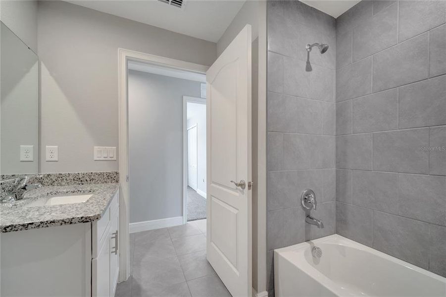 Furnished interior view inside a new home in , Kissimmee (Image 3).