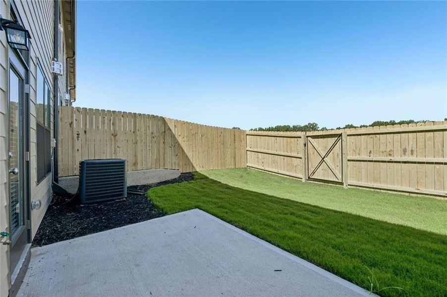 Exterior details and patio area of a home in Tribute, Hoschton (Image 3). Exterior details and patio area of a home in Tribute, Hoschton (Image 3).