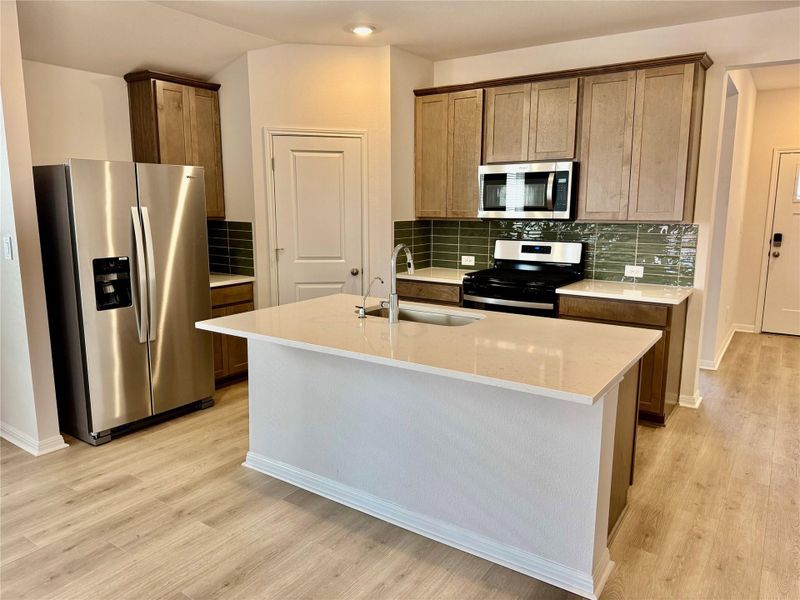 Furnished interior view inside a new home in Flora, Hutto (Image 4).