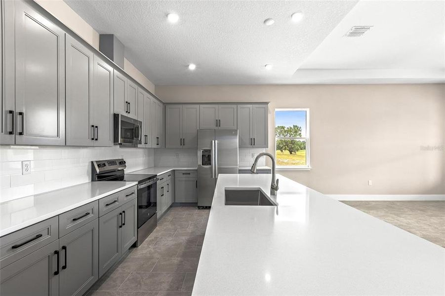 Furnished interior view inside a new home in Gray Hawk at Hole Two, Daytona Beach (Image 41). Furnished interior view inside a new home in Gray Hawk at Hole Two, Daytona Beach (Image 41).