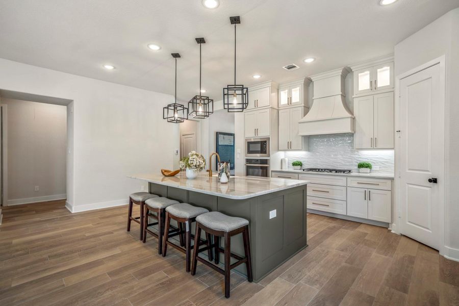 Furnished interior view inside a new home in ARTAVIA, Conroe (Image 27).