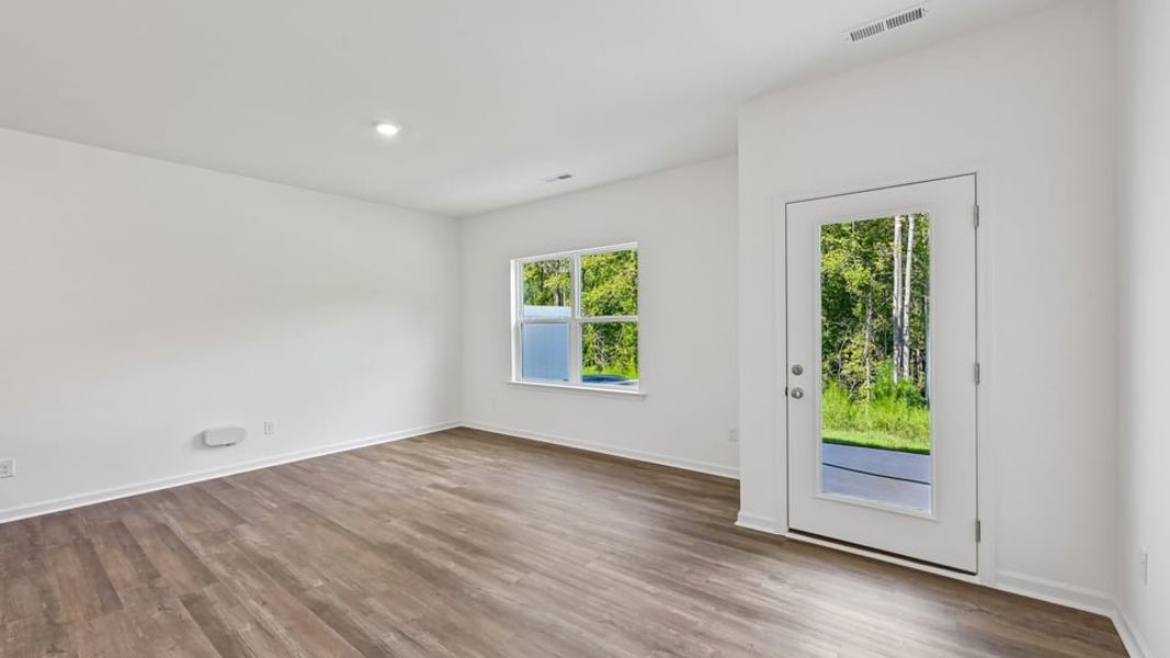 Spacious, unfurnished interior of a new home in The Townes at Belle Grove, Wendell (Image 8).