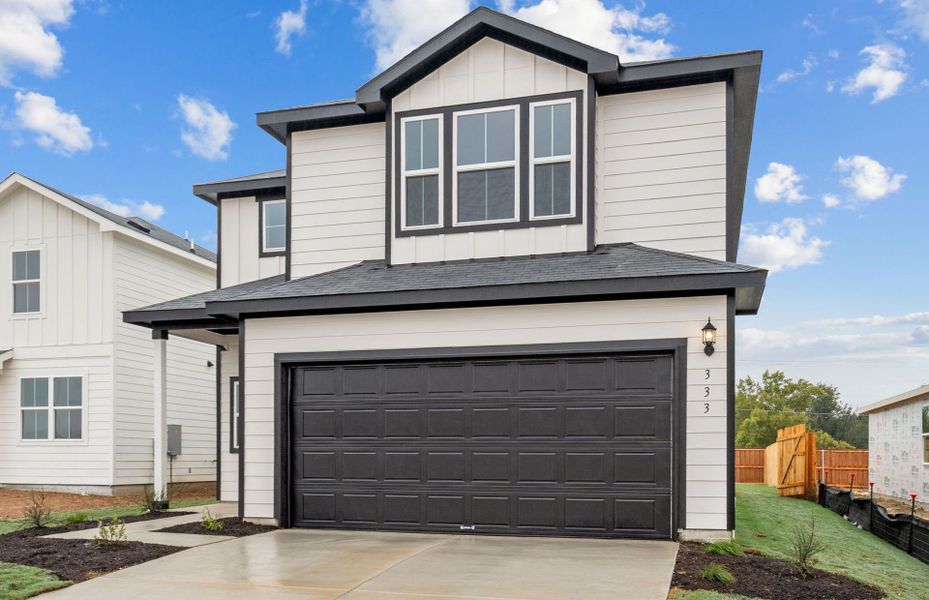 Front exterior of a new home in Larson Crossing, Elgin, TX, highlighting curb appeal (Image 19).