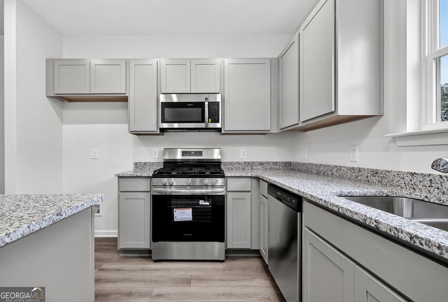 Furnished interior view inside a new home in Stonebridge North, Macon (Image 7).
