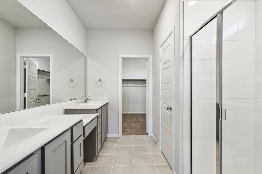 Primary Bathroom in the Sapphire home plan by Trophy Signature Homes – REPRESENTATIVE PHOTO