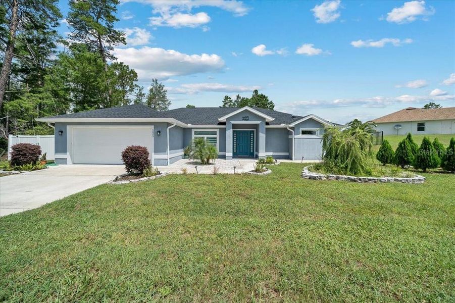 Front exterior of a new home in , Ocala, FL, highlighting curb appeal (Image 36). Front exterior of a new home in , Ocala, FL, highlighting curb appeal (Image 36).