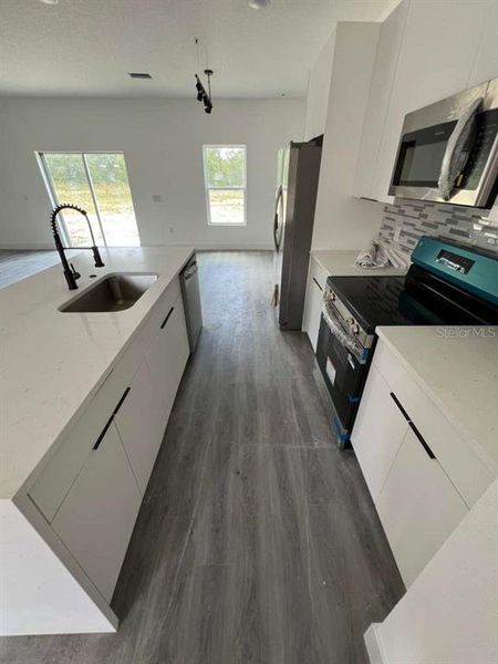 Furnished interior view inside a new home in , Lake Wales (Image 6).