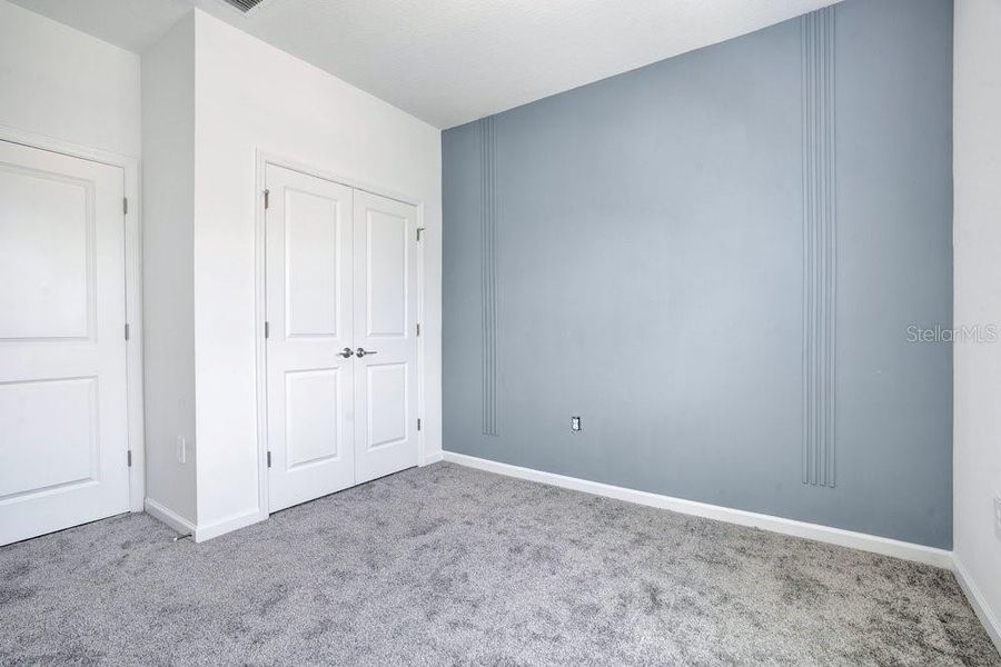 Spacious, unfurnished interior of a new home in Wellness Ridge, Clermont (Image 30).