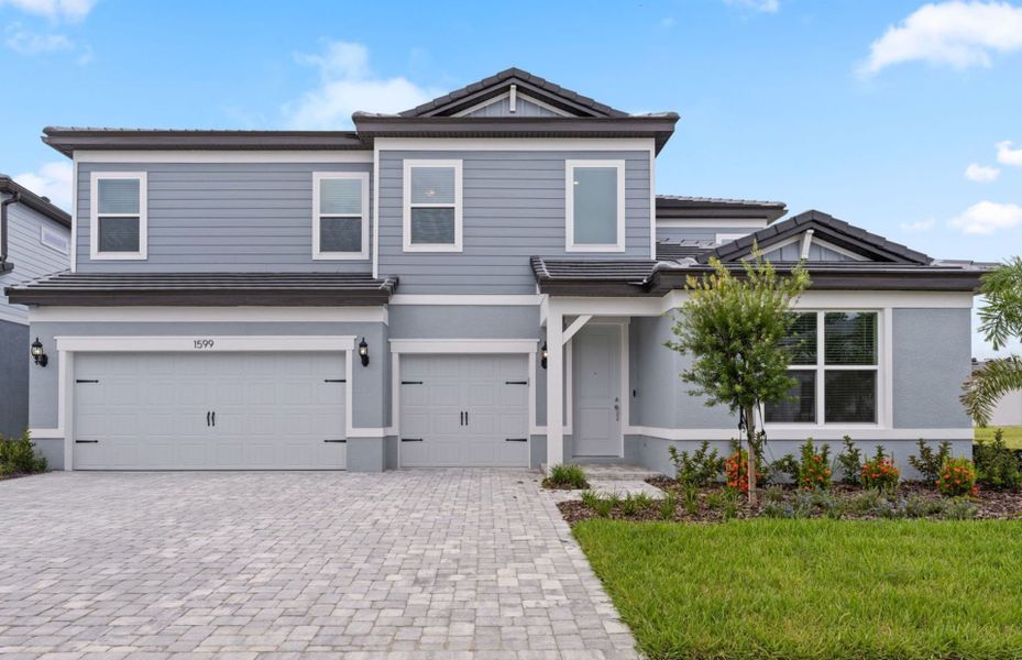 Representative exterior photo of a completed home built from the Merlot Grand by Pulte Homes in Two Rivers, Zephyrhills, FL (Image 20). Representative exterior photo of a completed home built from the Merlot Grand by Pulte Homes in Two Rivers, Zephyrhills, FL (Image 20).