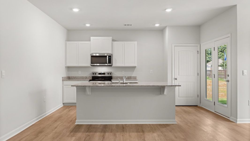 Representative furnished interior of a home built from the KERRY by D.R. Horton in Northberry, Rome (Image 7).
