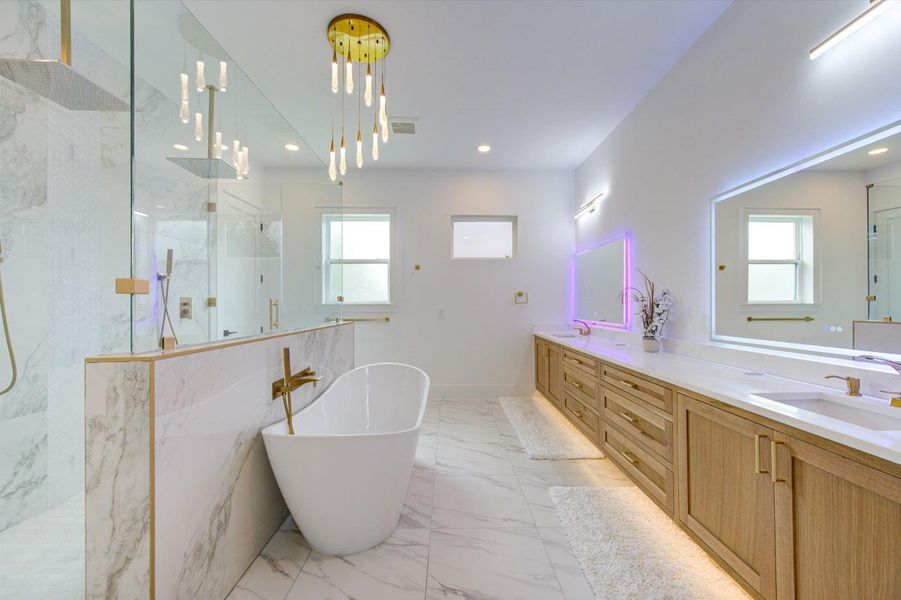 A jaw-dropping Primary Bathroom with every luxury feature to make both King and Queen feel truly pampered.