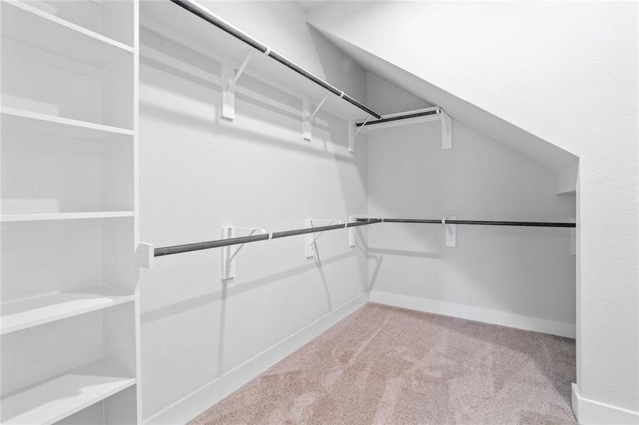 Look at this immaculate closet! With high shelving, multiple rows to hang clothing, you are sure to have enough room for all your belongings!