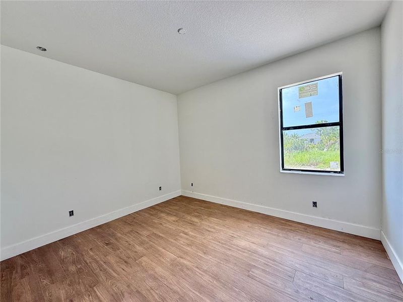 Spacious, unfurnished interior of a new home in , Port Charlotte (Image 9).