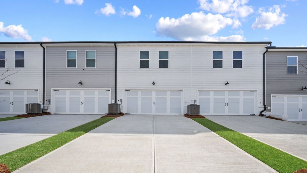Front exterior of a new home in Echo Glen, Stockbridge, GA, highlighting curb appeal (Image 2).