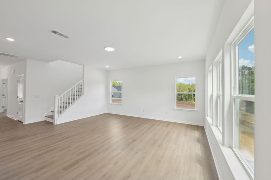 Representative unfurnished interior of a home built from the Jordan by Ashton Woods in Rowland's Grant, Fuquay Varina (Image 21).