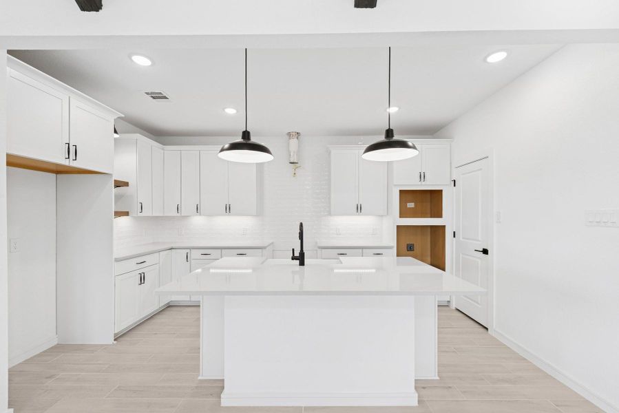 Gourmet island kitchen (*Photo not of actual home and used for illustration purposes only.) Gourmet island kitchen (*Photo not of actual home and used for illustration purposes only.)